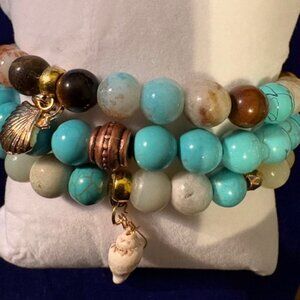 Elegant, coastal-inspired bracelet set—perfect for a beachy, boho layered style